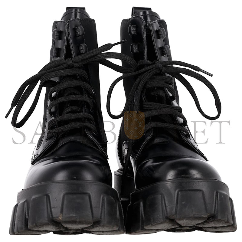 Pra*a monolith combat boots in black leather